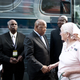 Rep. John Lewis (center) shakes hand with fellow Freedom Rider.(Kris Connor/Getty)